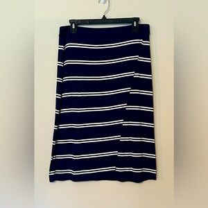 Tommy Hilfiger summer lightweight skirt. Waist 16 1/2 and Length 26 inches.
